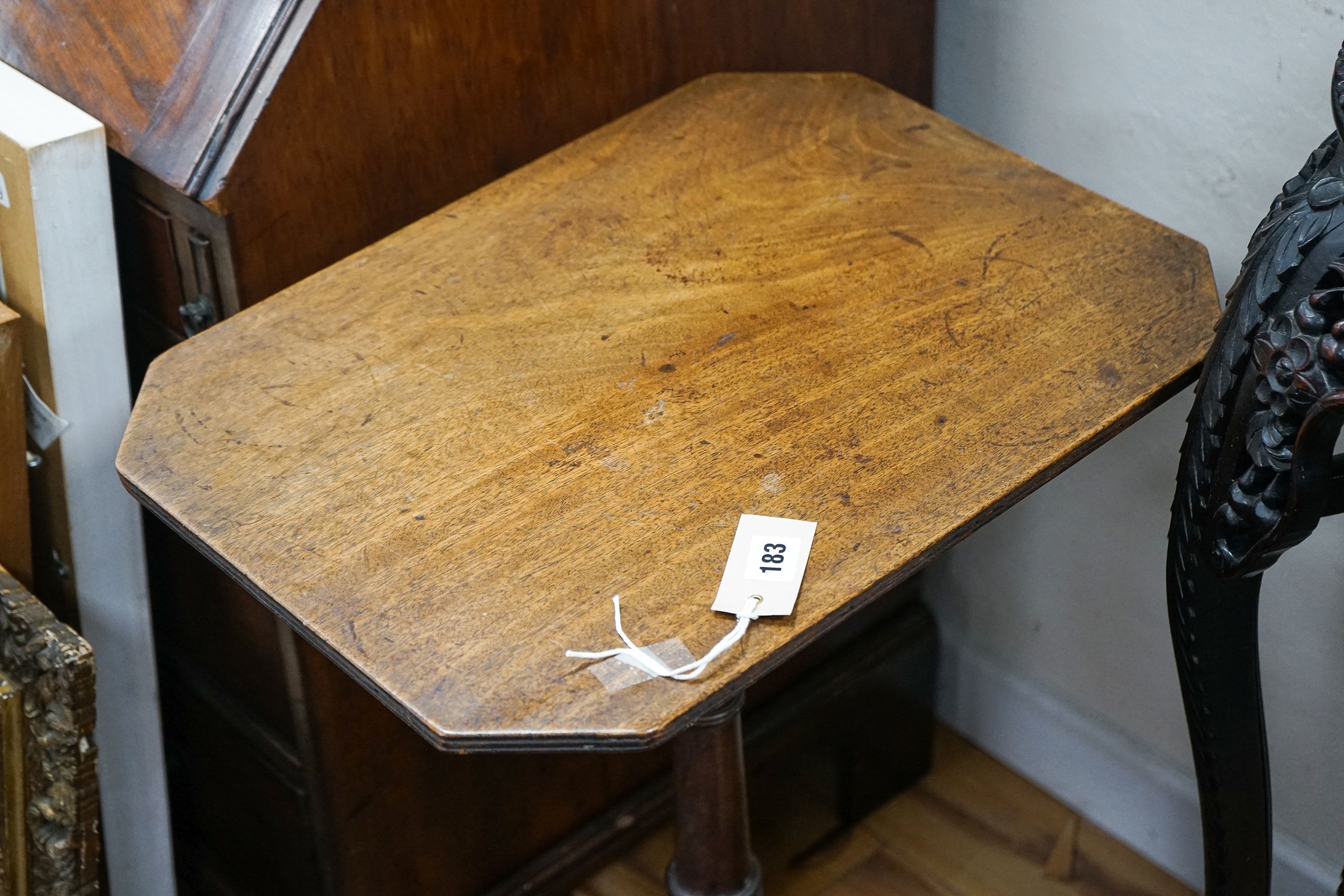 A 19th century mahogany octagonal tilt-top occasional table, the octagonal top on turned column and tripartie base, width 51cm, depth 38cm, height 74cm